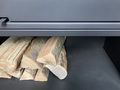 photo detail de compartiment de stockage de poele a bois modele LOFT